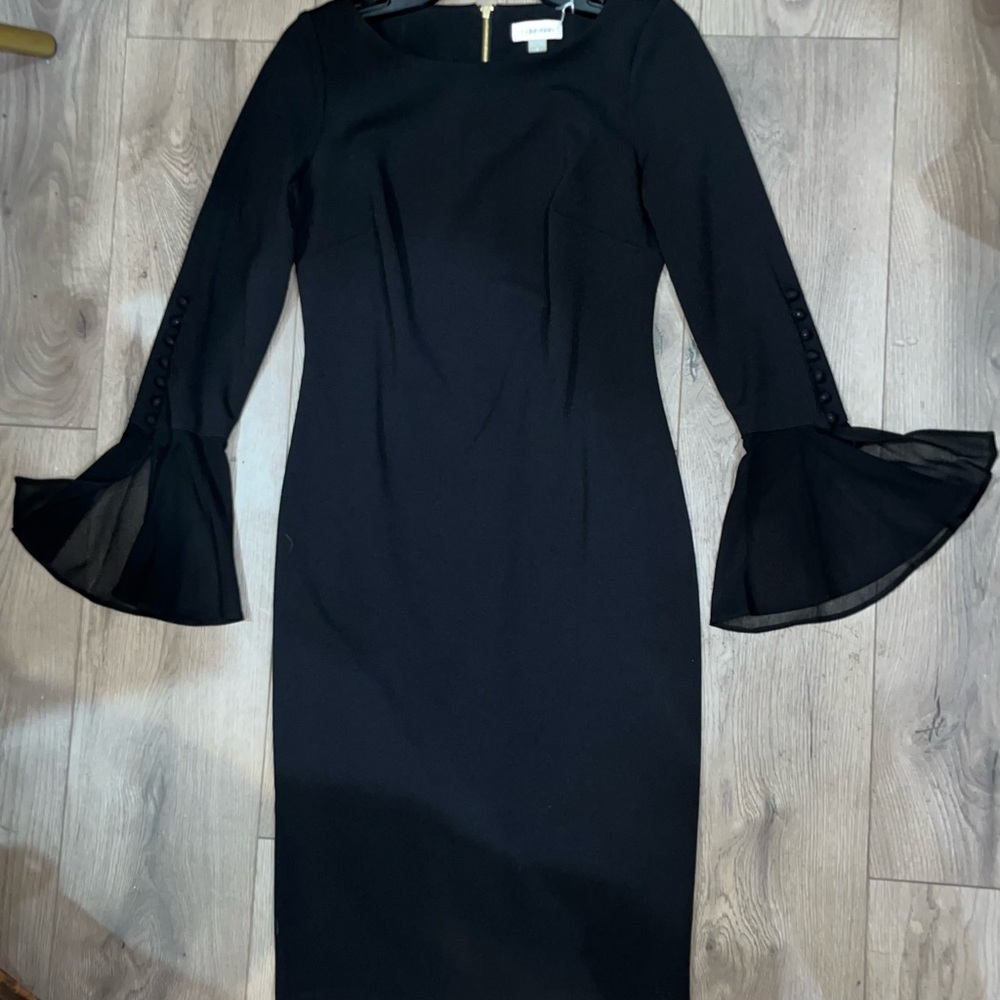 Elegant Black Dress with Flared Sleeves. Calvin Klein.